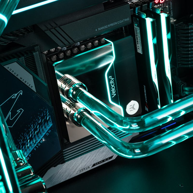 Close-up of the CPU cooler with lighting activated and view of the hard tubes